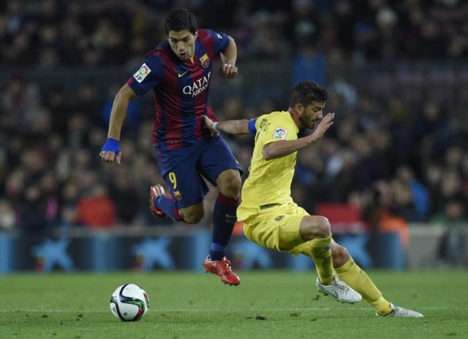 Luis Surez y Musacchio, durante el partido de ida en el Camp Nou.