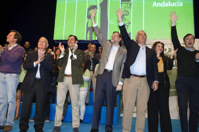 Mariano Rajoy, Javier Arenas y Juan Manuel Moreno, en el acto del PP...
