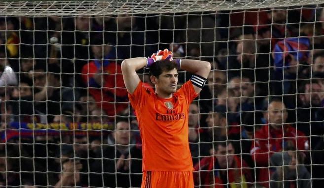 Real Madrid's goalkeeper Iker Casillas reacts during their...