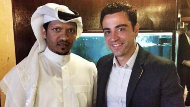 Xavi, junto al director deportivo del Al Sadd, director deportivo...