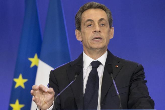 Sarkozy, durante una rueda de prensa celebrada en la sede de su...