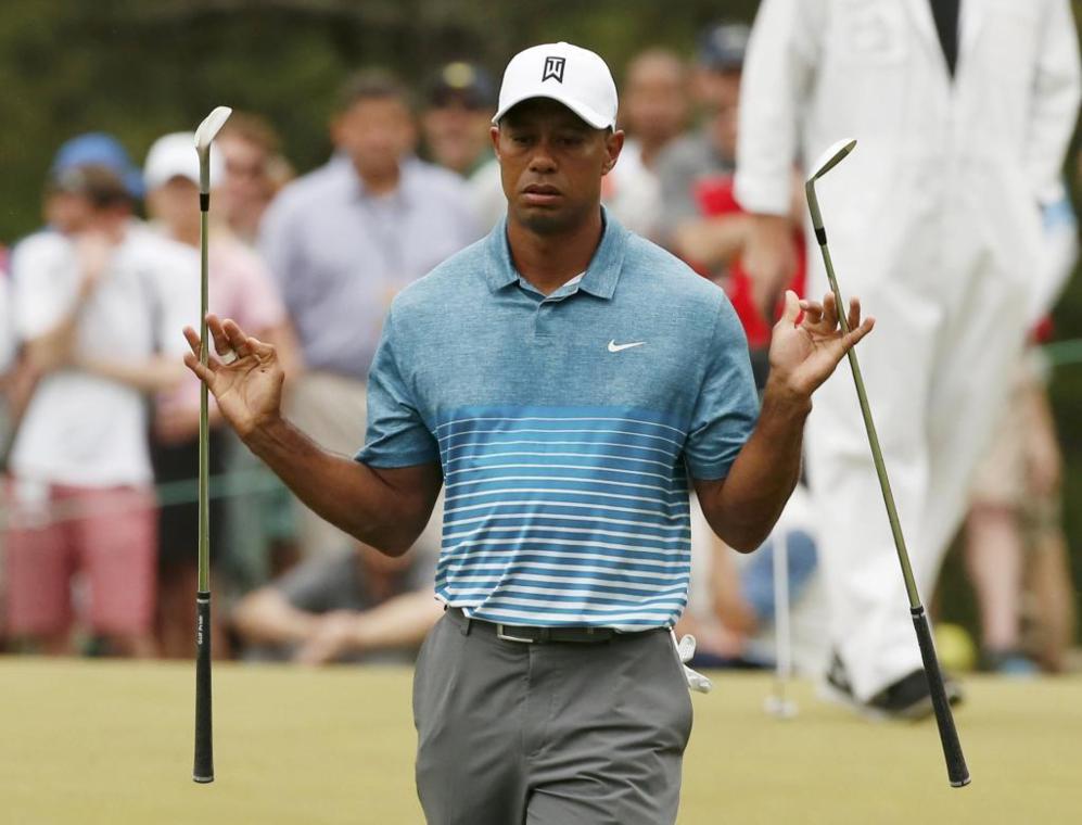 Tiger Woods, ganador de catorce torneos 'grandes', abandon la lista...