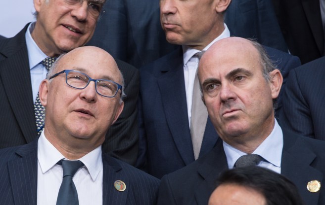 El ministro de Economía, Luis de Guindos, con su homólogo francés,...