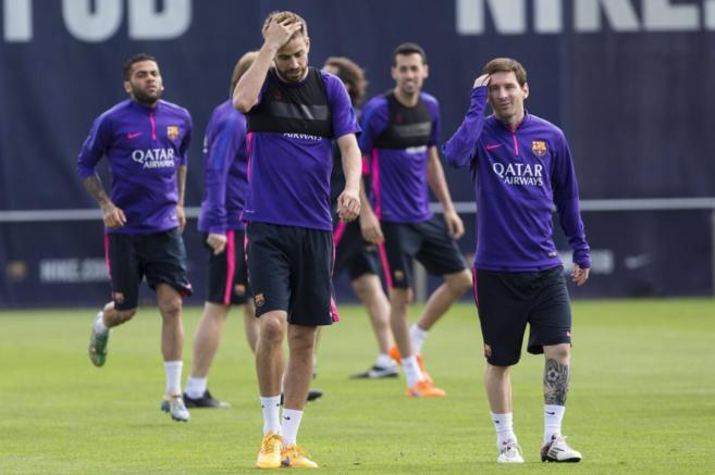 Piqu y Messi, durante el entrenamiento del Barcelona.