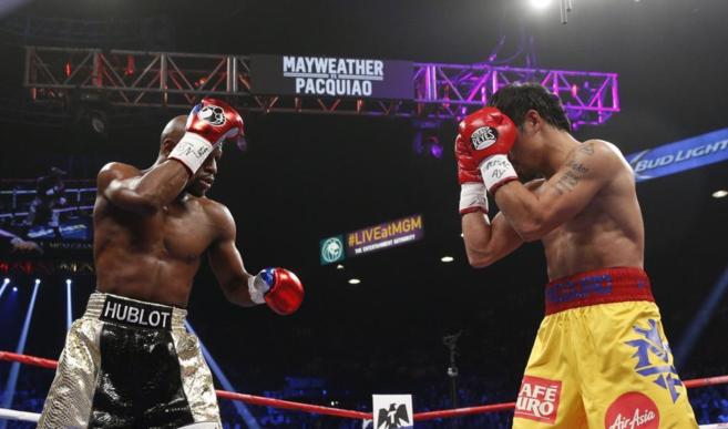 Pacquiao se cubre ante Mayweather