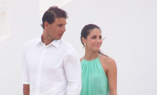 La pareja de guapos, Rafa Nadal y Xisca Perell, en una boda...