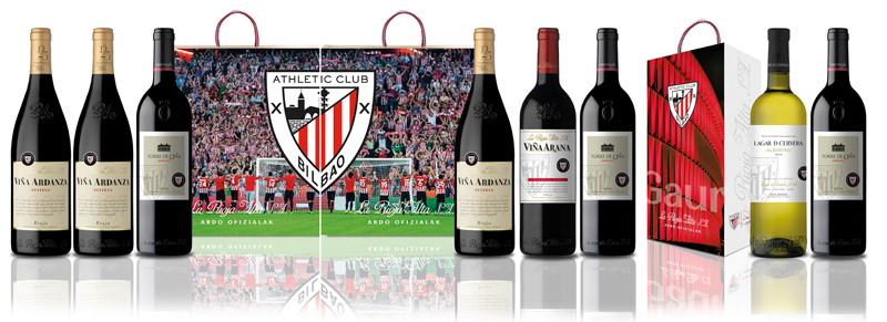 Los vinos del grupo bodegero La Rioja Alta junto a cajas con el escudo...