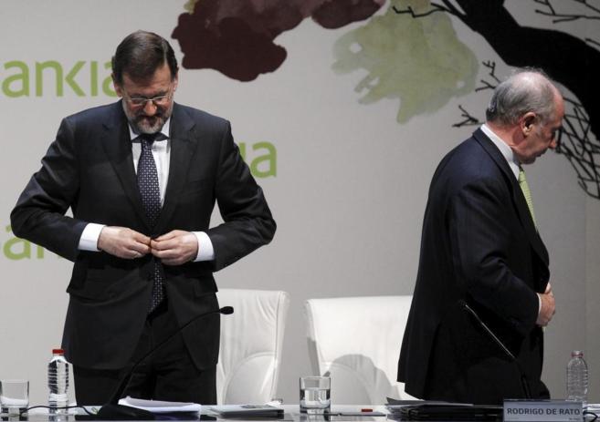 Mariano Rajoy junto al ex presidente de Bankia y ex vicepresidente del...
