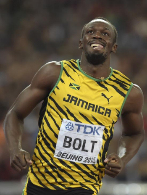 Aug 23, 2015; Beijing, China; Usain Bolt (JAM) reacts after winning...
