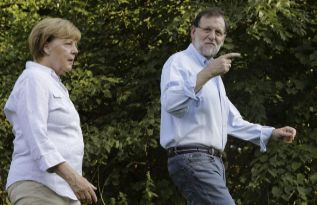 Rajoy y Merkel, en el encuentro mantenido hoy.