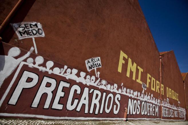 Pintada realizada en una calle de Lisboa contra el FMI.