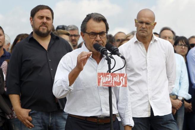 Artur Mas, junto a Oriol Junqueras y Ral Romeva.