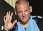 U.S. serviceman Spencer Stone waves as he departs the Clinique Lille...