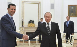 El presidente sirio (izda) y el ruso en el Kremlin.