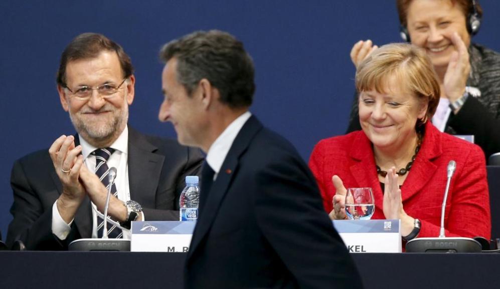Mariano Rajoy y Angela Merkel aplauden la intervencin del ex...