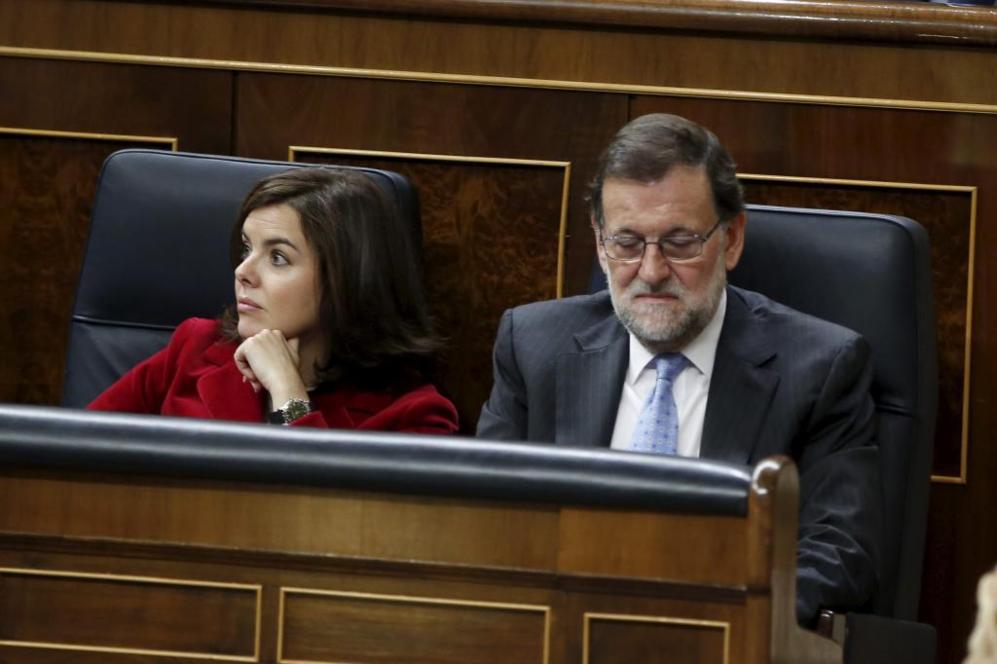 Soraya Senz de Santamara y Mariano Rajoy.