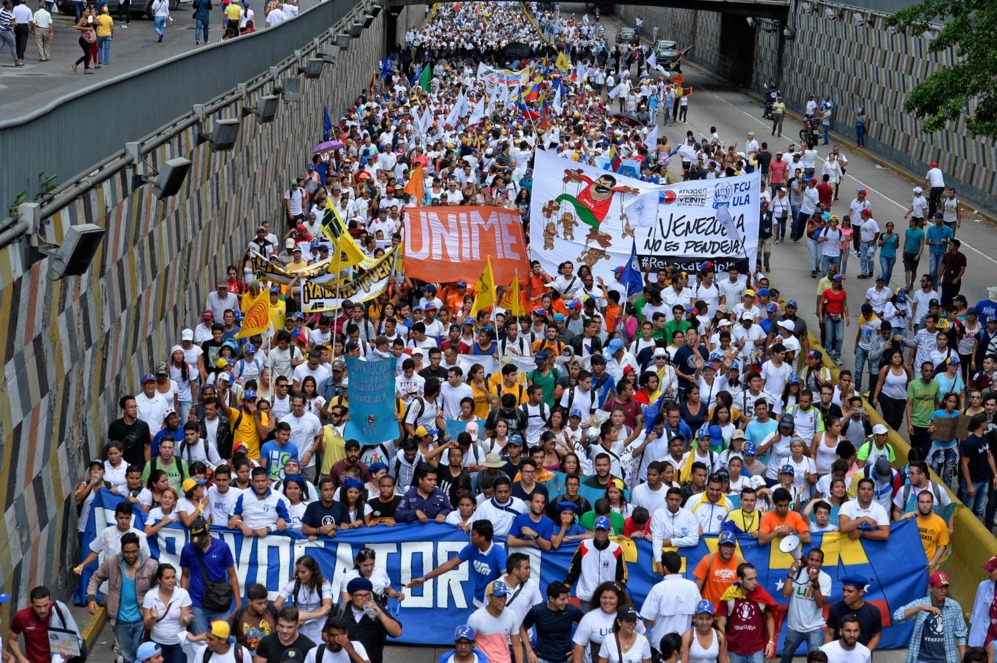 Miles de venezolanos se han trasladado a la capital pese a las trabas...