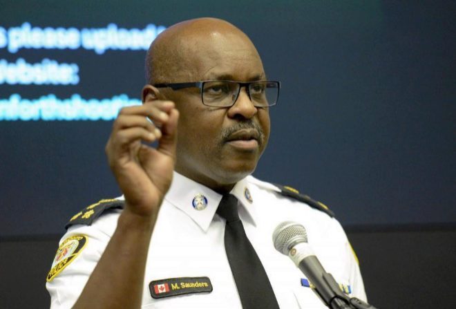 Toronto police Chief Mark Saunders speaks to reporters about a shooting the night before in Toronto, Ontario, Canada on July 23, 2018. Toronto police were seeking to determine a motive on after a 29-year-old man opened fire with a handgun on restaurant goers and pedestrians in a busy neighborhood of Canada's largest city overnight, killing two people and wounding 13. / AFP PHOTO / Usman Khan