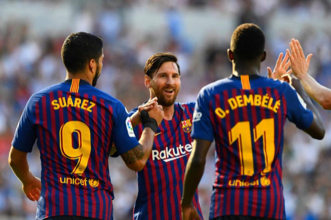 Los jugadores del FC Barcelona, Ousmane Dembele, Lionel Messi y Luis...