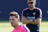 Messi, con Luis Enrique detrs, en un entrenamiento del Bara en 2014.