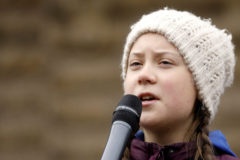 FILE PHOTO: 16-year-old Swedish environmental activist <HIT>Greta</HIT> Thunberg is seen on stage as she takes part in a protest calling for urgent measures to combat climate change, in Hamburg, Germany, March 1, 2019. REUTERS/Morris Mac Matzen/File Photo