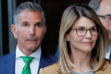 FILE PHOTO: Actor <HIT>Lori</HIT> Loughlin and her husband Mossimo Giannulli leave the federal courthouse in Boston