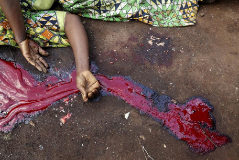 ATTENTION EDITORS - VISUAL COVERAGE OF SCENES OF INJURY OR DEATH A body of a woman lies on the ground after she and four other women were killed in Paida near Beni, North Kivu Province of Democratic Republic of <HIT>Congo</HIT>, December 7, 2018. According to a FARDC spokesman, Captain Mac Hazukay, 18 people were killed during the last two days by the Islamist rebel group "Allied Democratic Forces" (ADF) in the village of Paida and the area around the village. REUTERS/Goran Tomasevic TEMPLATE OUT - RC153E78E0D0