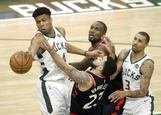 AG3. <HIT>Milwaukee</HIT> (United States).- <HIT>Milwaukee</HIT> Bucks forward Giannis Antetokounmpo (L) of Greece swats the ball away from Toronto Raptors guard Fred VanVleet (C, bottom) during game 2 of the NBA Eastern Conference finals between the Toronto Raptors and the <HIT>Milwaukee</HIT> Bucks at Fiserv Forum in <HIT>Milwaukee</HIT>, Wisconsin, USA, 17 May 2019. (Baloncesto, Grecia, Estados Unidos) EPA/ SHUTTERSTOCK OUT