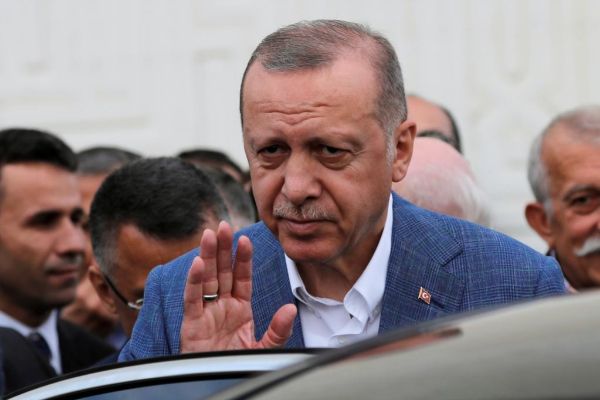 Turkish President <HIT>Erdogan</HIT> leaves a mosque in Istanbul