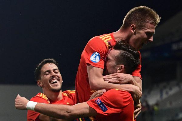 <HIT>Spain</HIT>&amp;apos;s forward Dani Olmo (Top) celebrates scoring with...