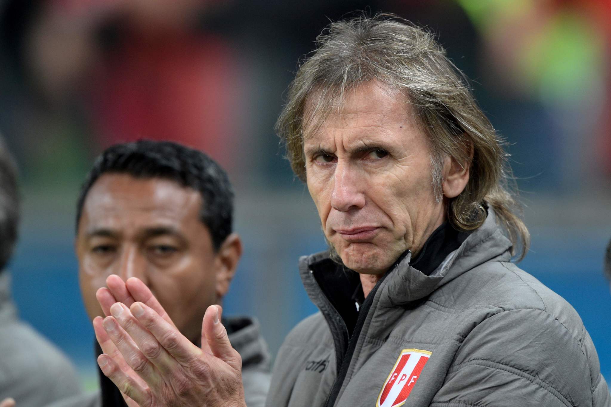 Peru&amp;apos;s coach Argentine Ricardo <HIT>Gareca</HIT> applauds during the...