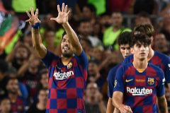 Barcelona's Uruguayan forward <HIT>Luis</HIT> <HIT>Suarez</HIT> (L) celebrates after scoring a goal during the 54th Joan Gamper Trophy friendly football match between Barcelona and Arsenal at the Camp Nou stadium in Barcelona on August 4, 2019. (Photo by Josep LAGO / AFP)