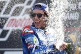 Suzuki Ecstar's Spanish rider Alex <HIT>Rins</HIT> sprays champagne on the podium as he celebrates his victory in the Moto GP race of the British Grand Prix at Silverstone circuit in Northamptonshire, central England, on August 25, 2019. - Alex <HIT>Rins</HIT> won the British MotoGP in dramatic fashion as the Team Suzuki rider pipped world champion Marc Marquez to the finish line by 0.013 seconds at Silverstone on Sunday. (Photo by Adrian DENNIS / AFP)