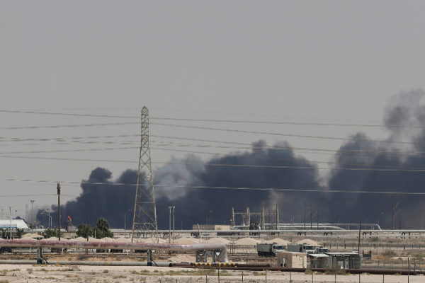 Smoke is seen following a fire at <HIT>Aramco</HIT> facility in the...