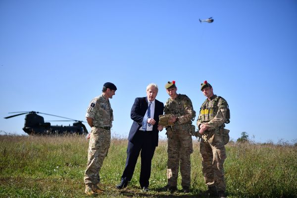 Britain&amp;apos;s Prime Minister <HIT>Boris</HIT> Johnson flies a Black Hornet...