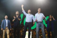 El presidente de Vox, Santiago Abascal (en el centro), junto a Ivn Espinosa (segundo, izqda.) y  Javier Ortega Smith.