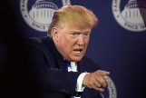 (FILES) In this file photo taken on October 12, 2019 US President Donald <HIT>Trump</HIT> gestures as he speaks at the Values Voter Summit at the Omni Shoreham Hotel in Washington, DC. - The White House on Monday condemned a video depicting a fake President Donald <HIT>Trump</HIT> shooting and stabbing media figures and political opponents that was shown at a conference for his supporters. (Photo by Eric BARADAT / AFP)