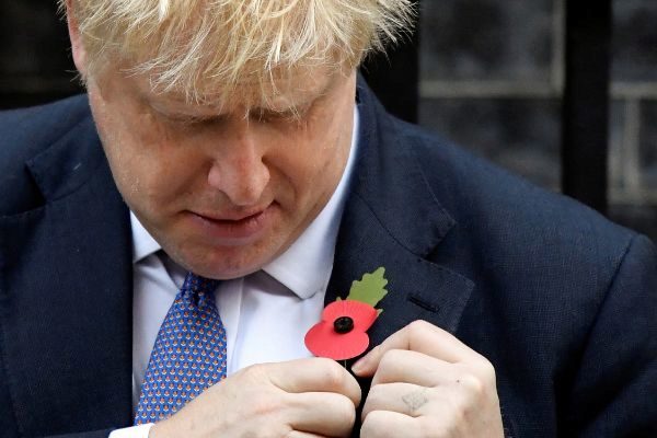 Britain&amp;apos;s PM <HIT>Johnson</HIT> attends a Poppy Appeal photocall in...