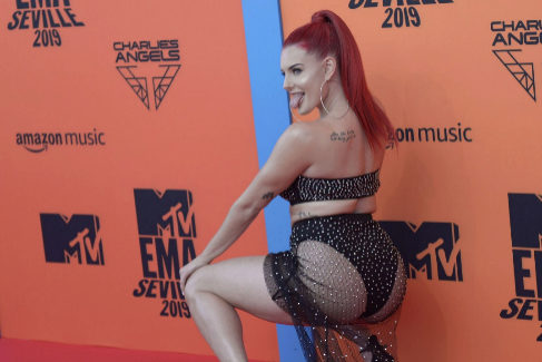 US artist <HIT>Justina</HIT> <HIT>Valentine</HIT> poses on the red carpet upon arrival to the MTV Europe Music Awards at the FIBES Conference and Exhibition Centre of Seville on November 3, 2019. (Photo by CRISTINA QUICLER / AFP)