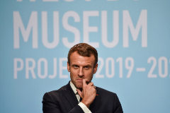 French President Emmanuel Macron reacts during the inauguration of Centre <HIT>Pompidou</HIT> West Bund Museum in Shanghai