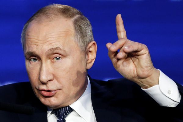Russian President Vladimir <HIT>Putin</HIT> speaks during an annual...