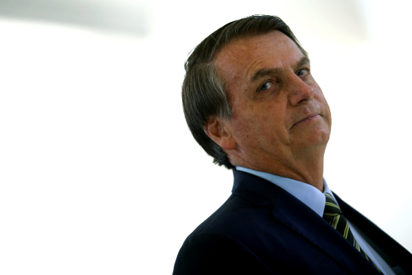 Brazil&amp;apos;s President Jair <HIT>Bolsonaro</HIT> attends a promotion...