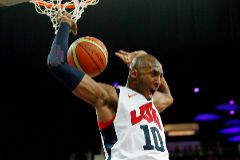FILE PHOTO: Bryant of the U.S. dunks against Spain during their men's gold medal basketball match at the North Greenwich Arena in London during the London 2012 Olympic Games