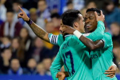 Real Madrid's Brazilian forward Vinicius Junior (R) celebrates with Real Madrid's Spanish forward Lucas Vazquez after scoring during the Copa del Rey (King's Cup) football match between <HIT>Zaragoza</HIT> and Real Madrid CF at La Romareda stadium in <HIT>Zaragoza</HIT>, on January 29, 2020. (Photo by JOSE JORDAN / AFP)