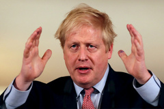 FILE PHOTO: British PM lt;HIT gt;Johnson lt;/HIT gt; addresses coronavirus outbreak at Downing Street in London