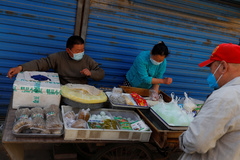 Puesto callejero de comida en Pekn.