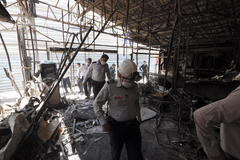 Tehran (Iran (islamic Republic Of)).- Iranian fire fighter officers inspect the scene of an explosion at the lt;HIT gt;Sina lt;/HIT gt; lt;HIT gt;Athar lt;/HIT gt; health centre in north of Tehran, Iran, 01 July 2020. Iranian state media outlets have reported at least 19 deaths caused by the explosion that appears to have taken place in the clinic's underground levels. Emergency personnel and firefighters have gathered at the medical centre. Authorities have yet to release official casualty figures. (Incendio, Tehern) EPA/