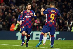 Leo Messi y Luis Surez celebran uno gol con el Barcelona.