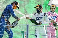 Winner AlphaTauri's French driver Pierre Gasly (C) celebrates with second placed McLaren's Spanish driver Carlos lt;HIT gt;Sainz lt;/HIT gt; Jr (L) and third placed Racing Point's Canadian driver Lance Stroll (R) on the podium after the Italian Formula One Grand Prix at the Autodromo Nazionale circuit in Monza on September 6, 2020. (Photo by MIGUEL MEDINA / POOL / AFP)