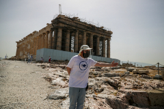 A Culture ministry employee wearing a face shield stands in front of the Parthenon temple as the lt;HIT gt;Acropolis lt;/HIT gt; archaeological site opens to visitors, following the easing of measures against the spread of the coronavirus disease (COVID-19), in Athens, Greece, May 18, 2020. REUTERS/Alkis Konstantinidis - RC28RG9HF8VJ